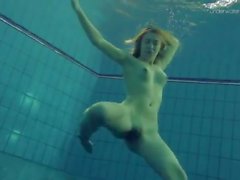 Ogle her amazing teen body in the pool