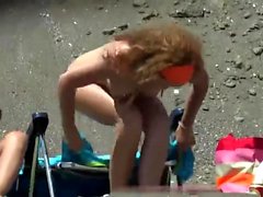 Nudist beach voyeur vid with a hot brunette