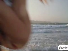 Three playmates go naked kite surfing