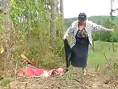 Big Tit Granny Fucks in the Woods